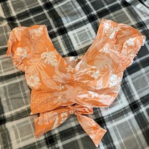 Bright orange crop top floral